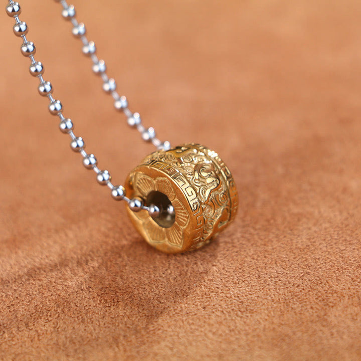 Naszyjnik z obrotowym wisiorkiem z Buddha Stones Om Mani Padme Hum wykonany ze stali tytanowej - Złoty Om Mani Padme Hum i łańcuszek ze stali tytanowej - image 1