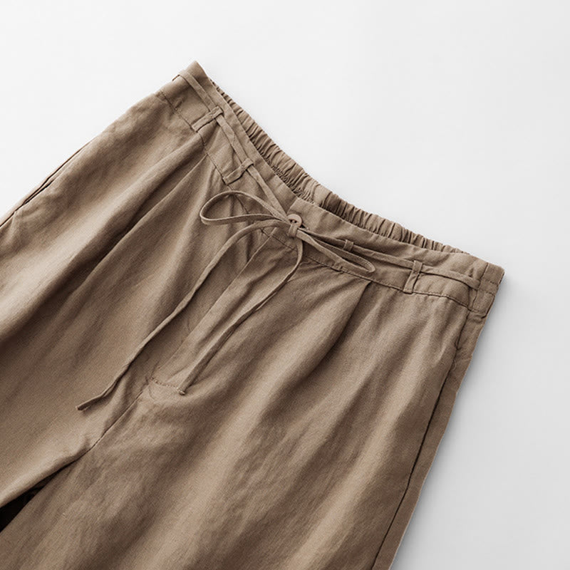 Spodnie damskie z bawełny z kieszeniami i motywem Buddha Stones, w jednolitym kolorze i sznurkiem - image 1