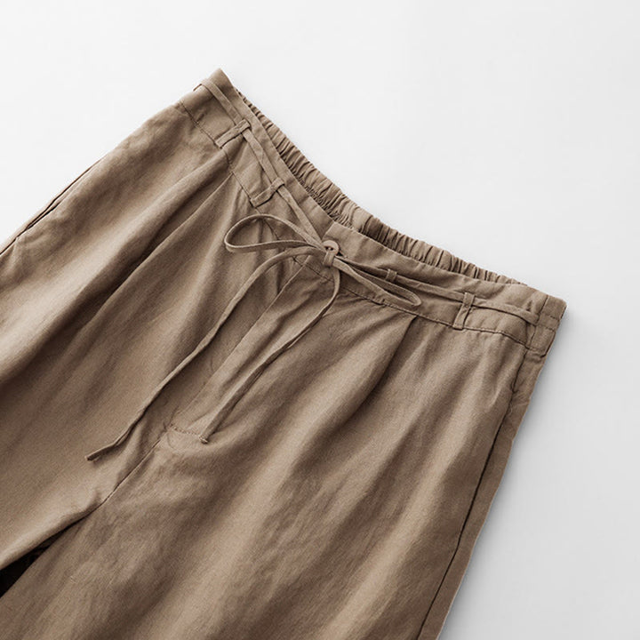 Spodnie damskie z bawełny z kieszeniami i motywem Buddha Stones, w jednolitym kolorze i sznurkiem - image 1