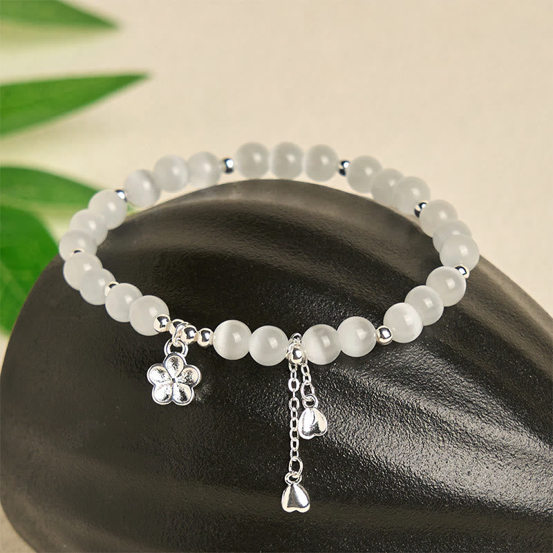 Bransoletka spokoju z naturalnych Buddha Stones z kocim okiem i kwiatem wiśni - image 1