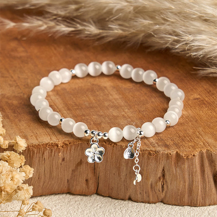 Bransoletka spokoju z naturalnych Buddha Stones z kocim okiem i kwiatem wiśni - Białe kocie oko (obwód nadgarstka: 15-17 cm) - image 0