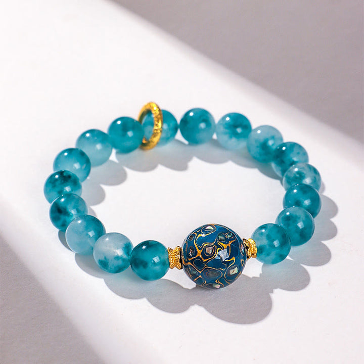 Bransoletka z koralików z naturalnego niebieskiego chalcedonu i Buddha Stones o średnicy 10 mm - image 1