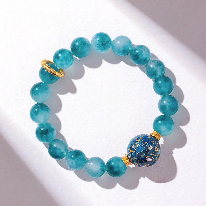 Bransoletka z koralików z naturalnego niebieskiego chalcedonu i Buddha Stones o średnicy 10 mm - image 2