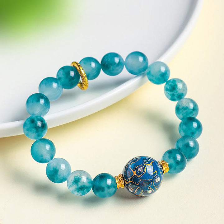 Bransoletka z koralików z naturalnego niebieskiego chalcedonu i Buddha Stones o średnicy 10 mm - image 4