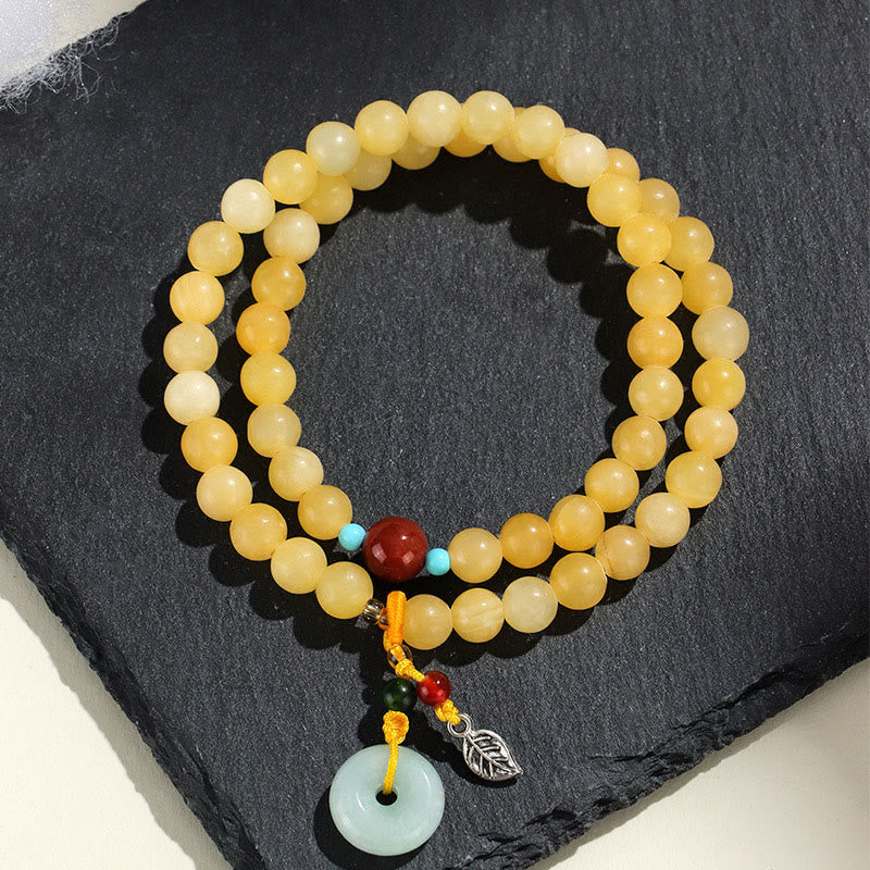 Bransoletka z podwójnym zapięciem i topazem z Buddha Stones , zdobiona klamrą pokoju i wzorem bogactwa - Topaz (obwód nadgarstka: 13-15 cm) - image 0
