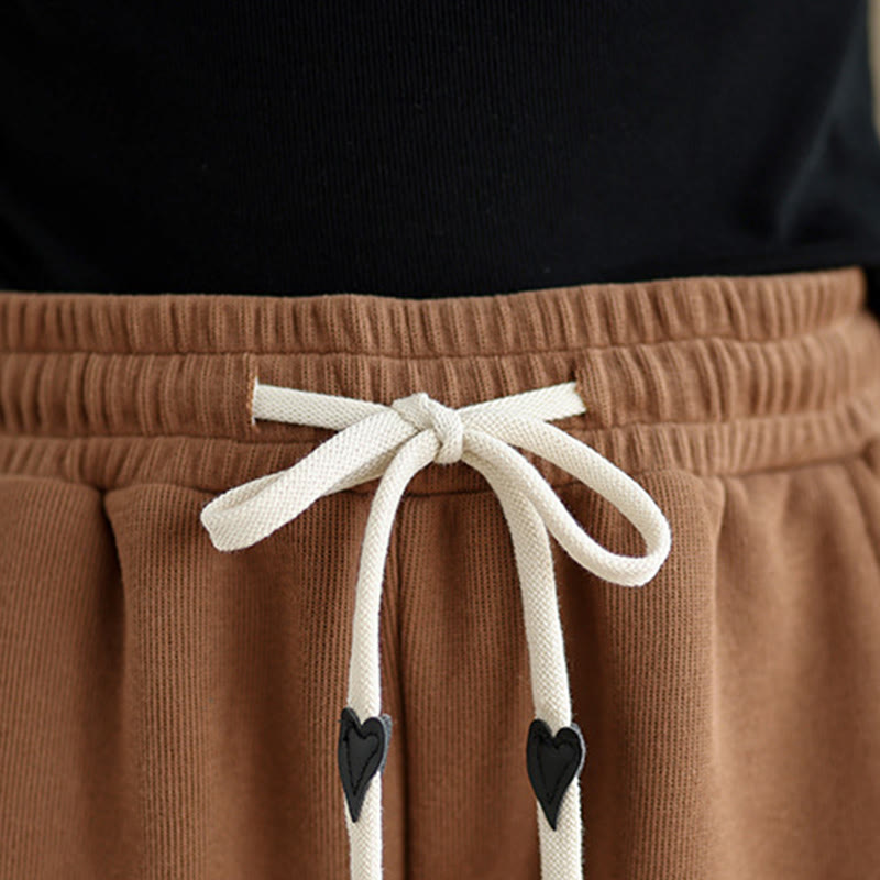 Damskie spodnie z szerokimi nogawkami i kieszeniami, w jednolitym kolorze z motywem Buddha Stones i sznurkiem - image 7