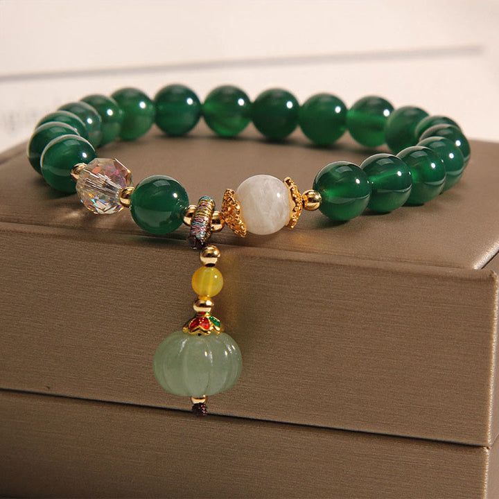 Bransoletka relaksacyjna z zielonymi kryształowymi koralikami dyniowymi z Buddha Stones - Zielony kryształ (obwód nadgarstka: 14-16 cm) - image 0