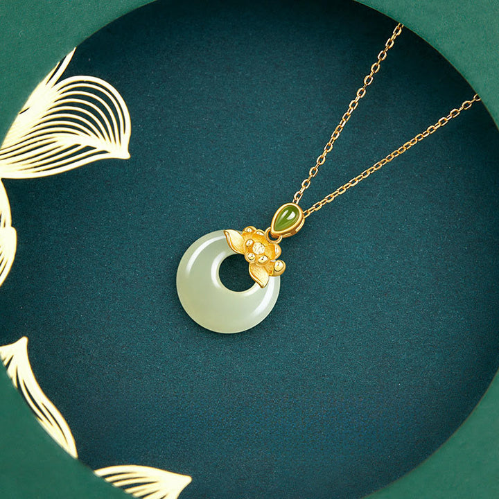 Naszyjnik z wisiorkiem z jadeitu Hetian z motywem lotosu i Buddha Stones wykonany ze srebra próby 925 i złota. - image 2