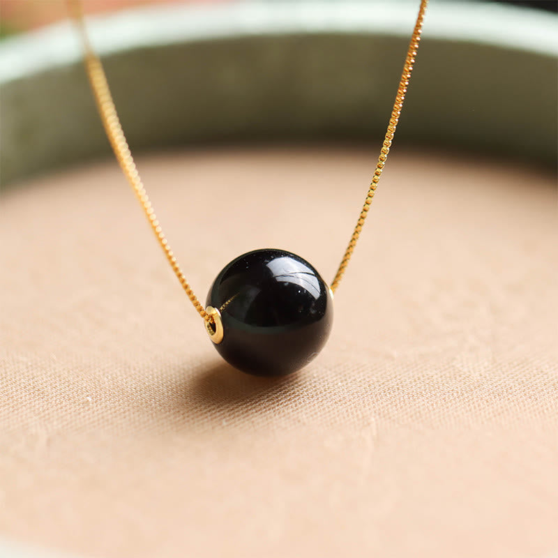 Naszyjnik z wisiorkiem "Buddha Stones" ze srebra próby 925 i bursztynowych koralików, z motywem skupienia i pewności siebie - image 2