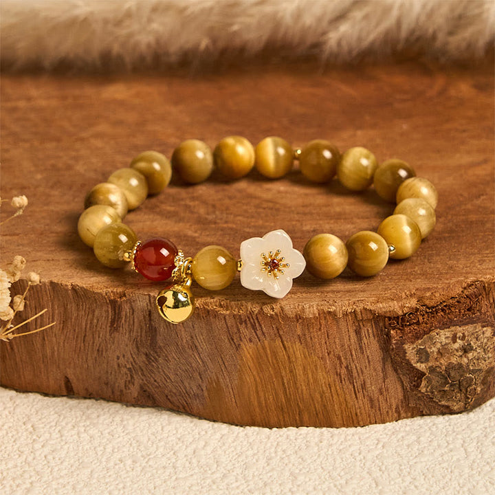 Bransoletka z Buddha Stones, naturalny złoty kwiat dzwonka z tygrysiego oka, dodająca odwagi - Tygrysie oko i biały kwiat (obwód nadgarstka: 14-16 cm) - image 0