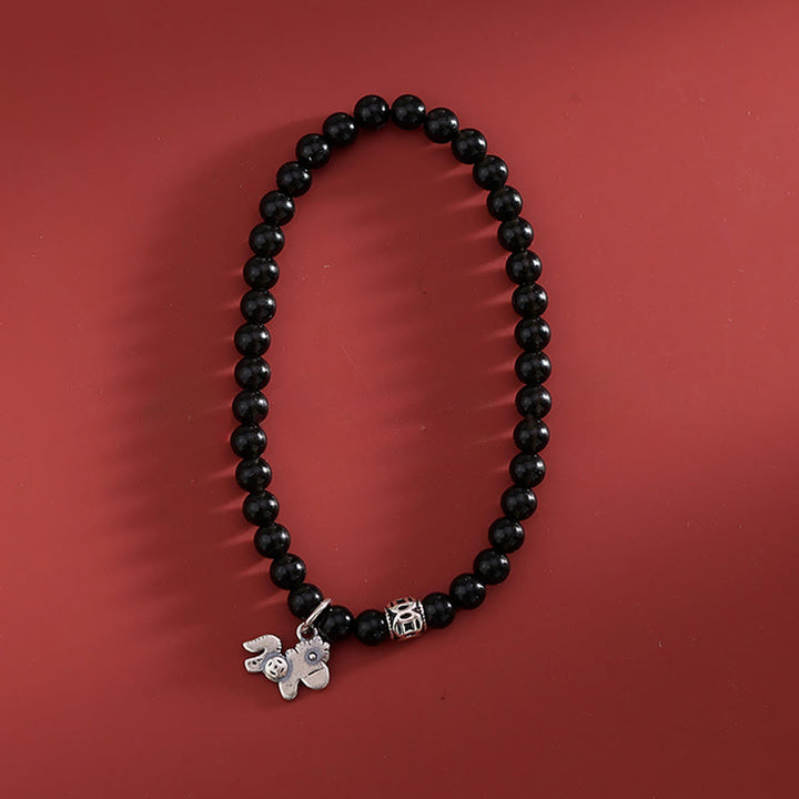 Bransoletka z Buddha Stones , Rok Konia, srebro próby 925, naturalny czarny obsydian, siła - image 1