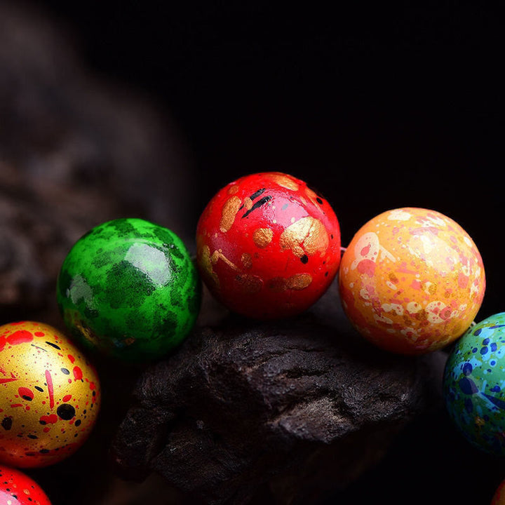 Bransoletka ochronna z Buddha Stones z wielokolorowym lakierem i drewnem sandałowym - image 3