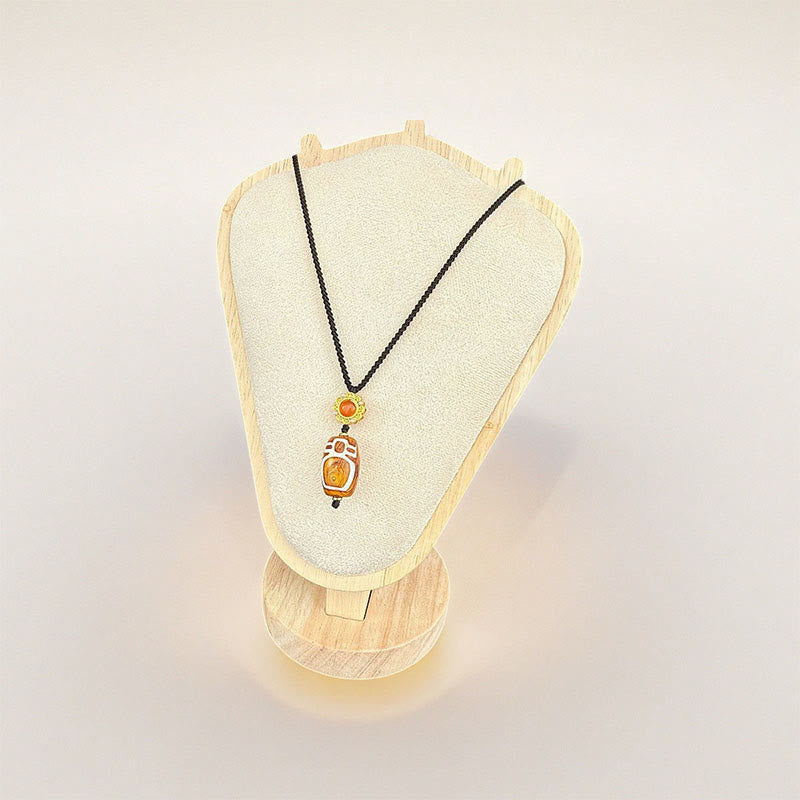 Buddha Stones, agatem tybetańskim, bóstwem bogactwa, dziewięciooką koralikową zawieszką Dzi z błogosławieństwem - image 1