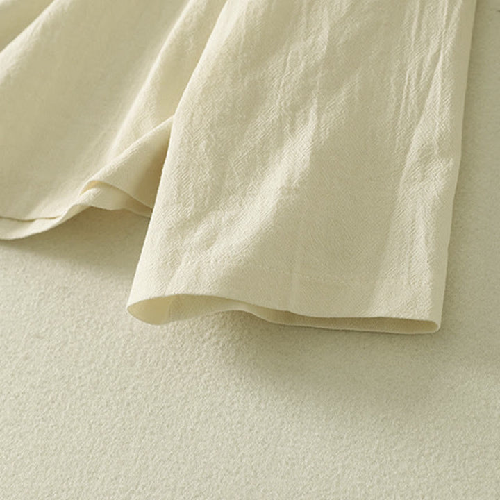 Koszula damska z długim rękawem z asymetrycznym przodem i guzikami w kształcie żaby z Buddha Stones - image 13