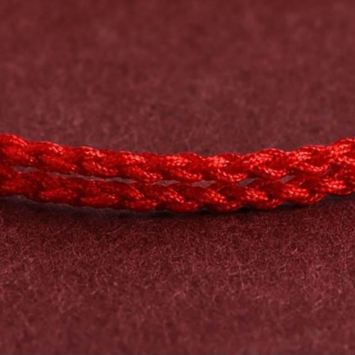 Bransoletka ochronna na kostkę z plecionego sznurka z Buddha Stones i pięcioma miedzianymi monetami - image 7