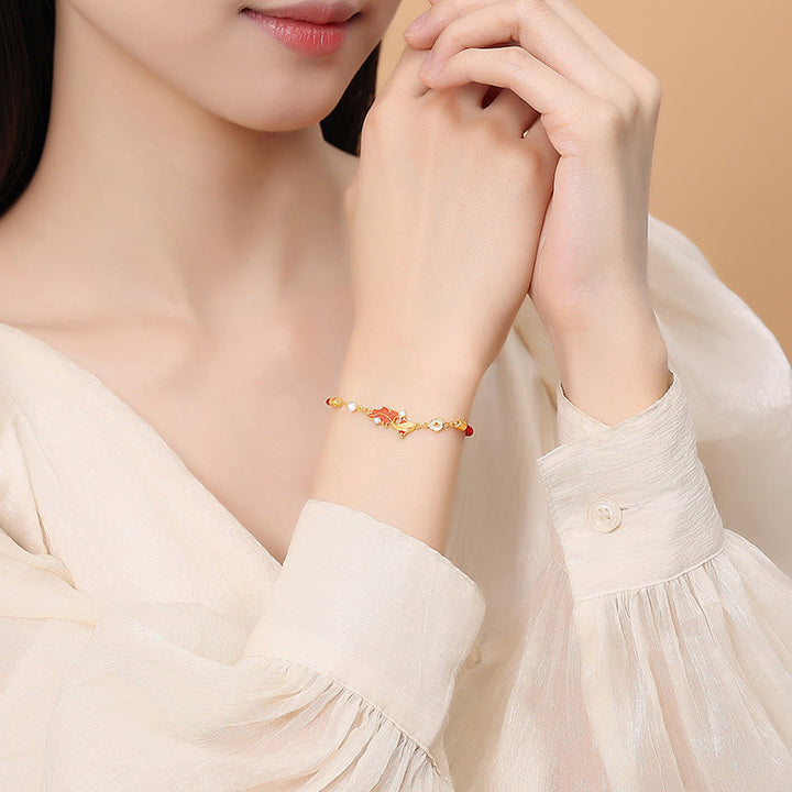 Bransoletka z czerwonego sznurka z motywem ryby Koi, wykonana ze srebra próby 925 z Buddha Stones i błogosławieństwem - image 2