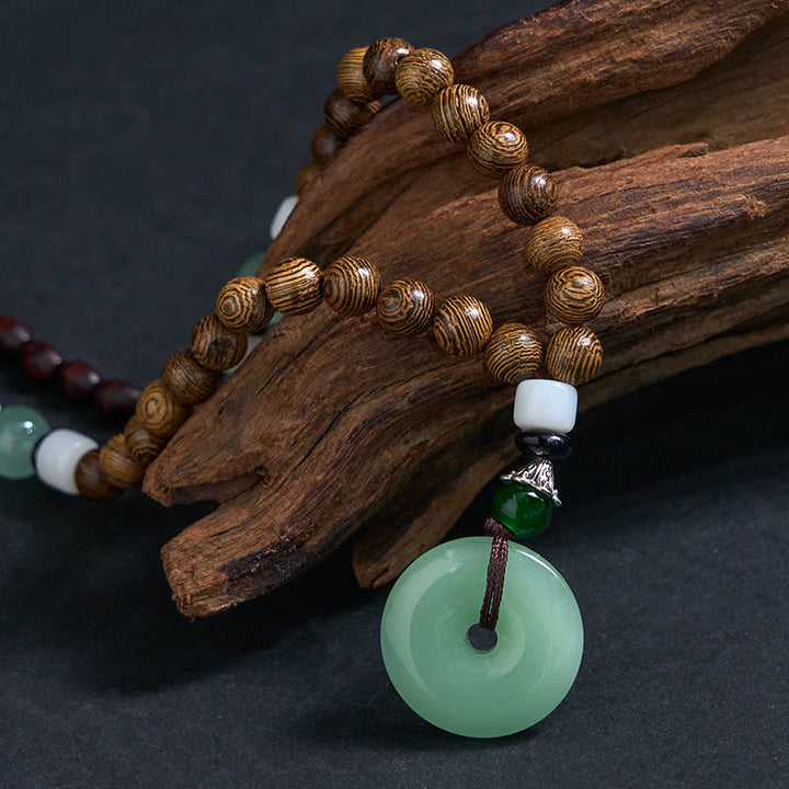 Naszyjnik z wisiorkiem "Balance Tranquility" z drewna wenge i Buddha Stones - image 3