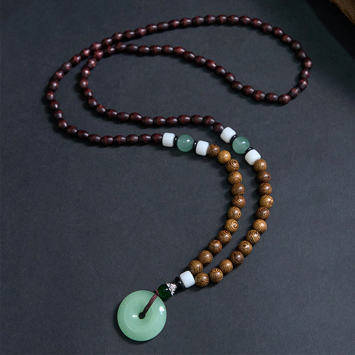 Naszyjnik z wisiorkiem "Balance Tranquility" z drewna wenge i Buddha Stones - image 1