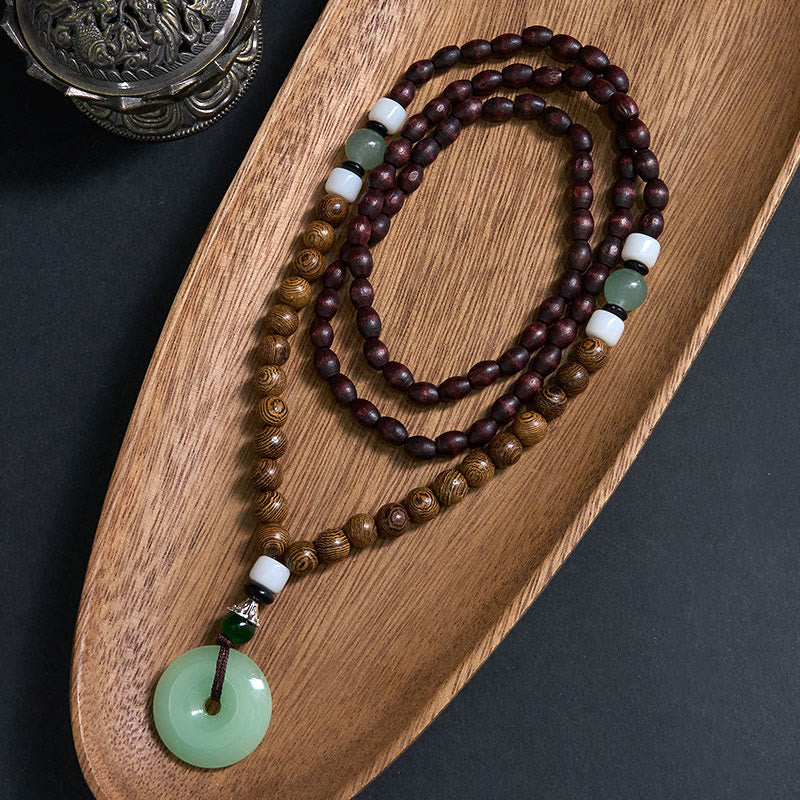 Naszyjnik z wisiorkiem "Balance Tranquility" z drewna wenge i Buddha Stones - Drewno wenge i klamra Peace - image 0