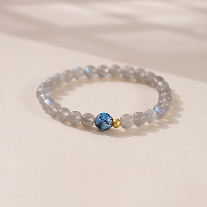 Bransoletka z naturalnego kamienia księżycowego i lotosu z motywem miłości Buddha Stones - Kamień księżycowy i lotos (obwód nadgarstka: 15-16 cm) - image 0