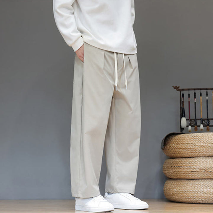 Męskie spodnie haremowe z kieszeniami i prostymi nogawkami w jednolitym kolorze z motywem Buddha Stones - image 17