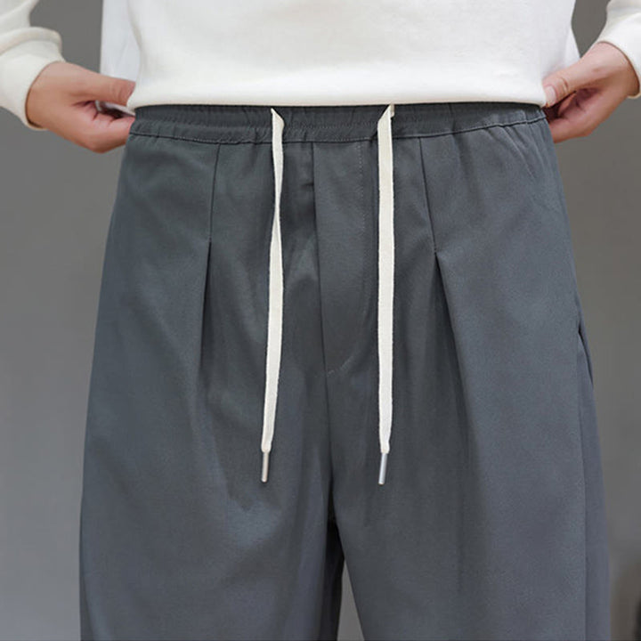 Męskie spodnie haremowe z kieszeniami i prostymi nogawkami w jednolitym kolorze z motywem Buddha Stones - image 9