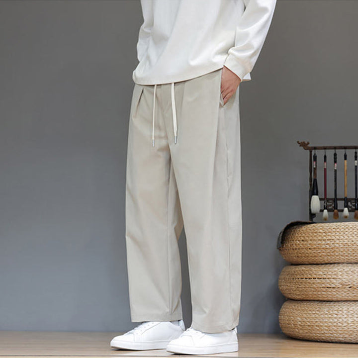 Męskie spodnie haremowe z kieszeniami i prostymi nogawkami w jednolitym kolorze z motywem Buddha Stones - image 16