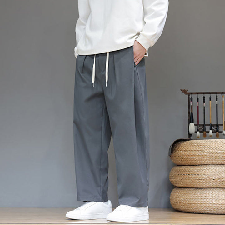 Męskie spodnie haremowe z kieszeniami i prostymi nogawkami w jednolitym kolorze z motywem Buddha Stones - image 4