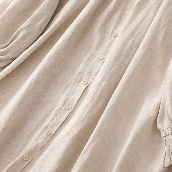 Sukienka midi z bawełny z długimi rękawami i kieszeniami, w kolorze beżowym z motywem Buddha Stones, z guzikami i klapami - image 5