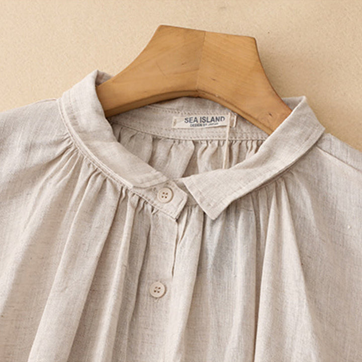 Sukienka midi z bawełny z długimi rękawami i kieszeniami, w kolorze beżowym z motywem Buddha Stones, z guzikami i klapami - image 2