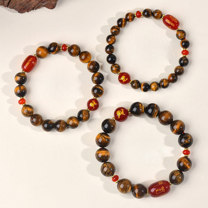 Bransoletka ochronna z 12 Buddha Stones z chińskiego znaku zodiaku, naturalnym tygrysim okiem i czerwonym agatem - image 1