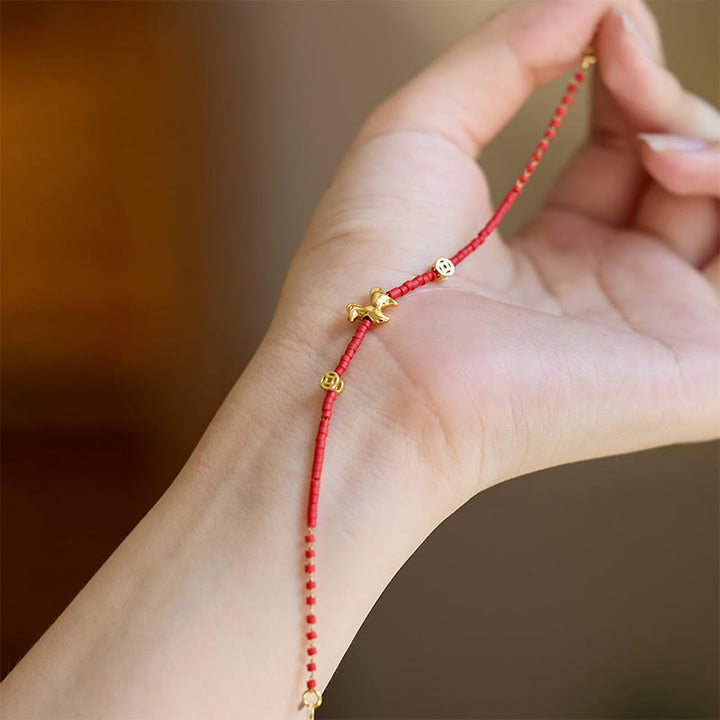 Bransoletka z Buddha Stones ze srebra próby 925, pozłacana, Rok Konia, szkło Liuli, czerwony, z napisem "Prosperity" - image 3