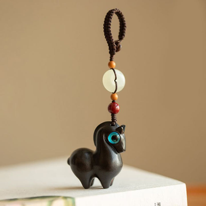 Buddha Stones Rok Konia Mały liść Czerwony sandałowiec Zielony sandałowiec Hebanowy uspokajający brelok - Drewno hebanowe - Lina guzikowa - image 0