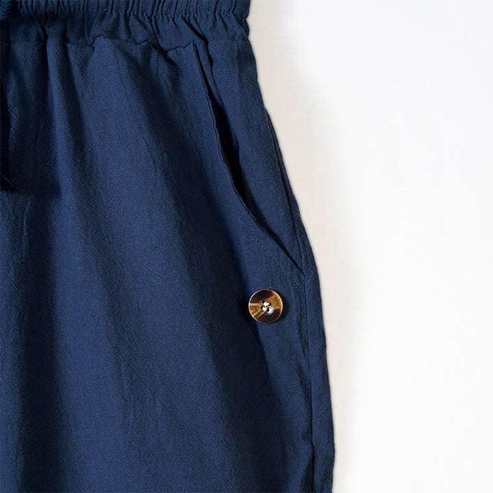 Męskie bawełniane spodnie z kieszeniami, guzikami w jednolitym kolorze i ściągaczem w kształcie Buddha Stones - image 3