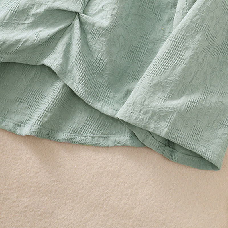 Koszula damska z długim rękawem z bawełny z nadrukiem "Buddha Stones" w nieregularnym dole i plisami - image 38