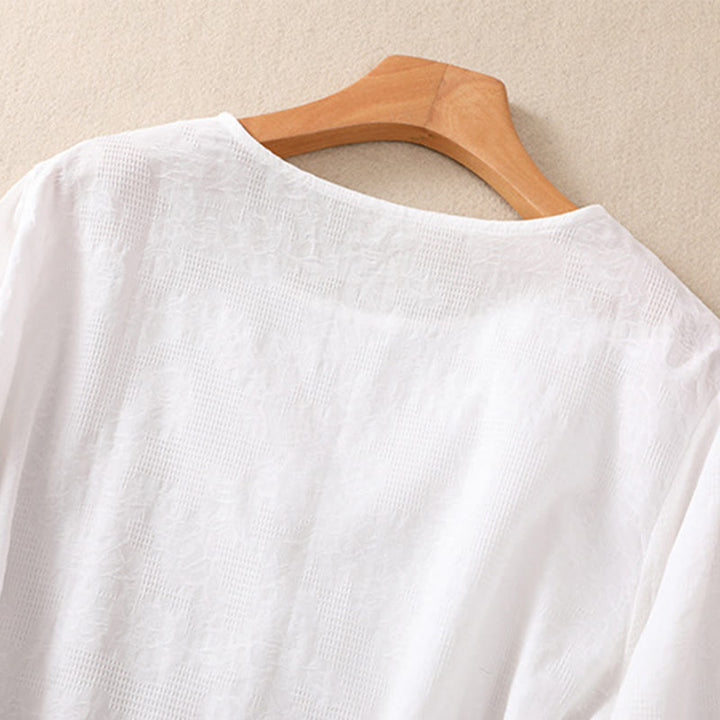 Koszula damska z długim rękawem z bawełny z nadrukiem "Buddha Stones" w nieregularnym dole i plisami - image 11