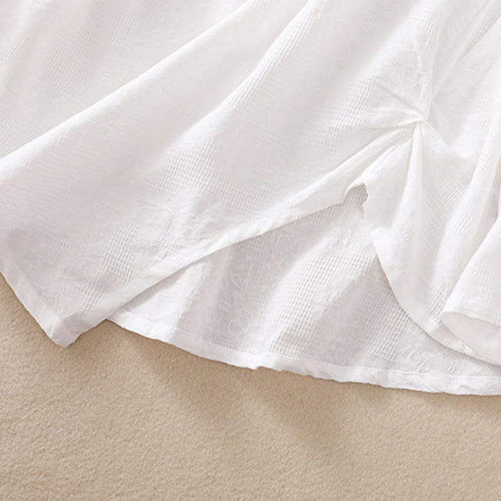 Koszula damska z długim rękawem z bawełny z nadrukiem "Buddha Stones" w nieregularnym dole i plisami - image 15