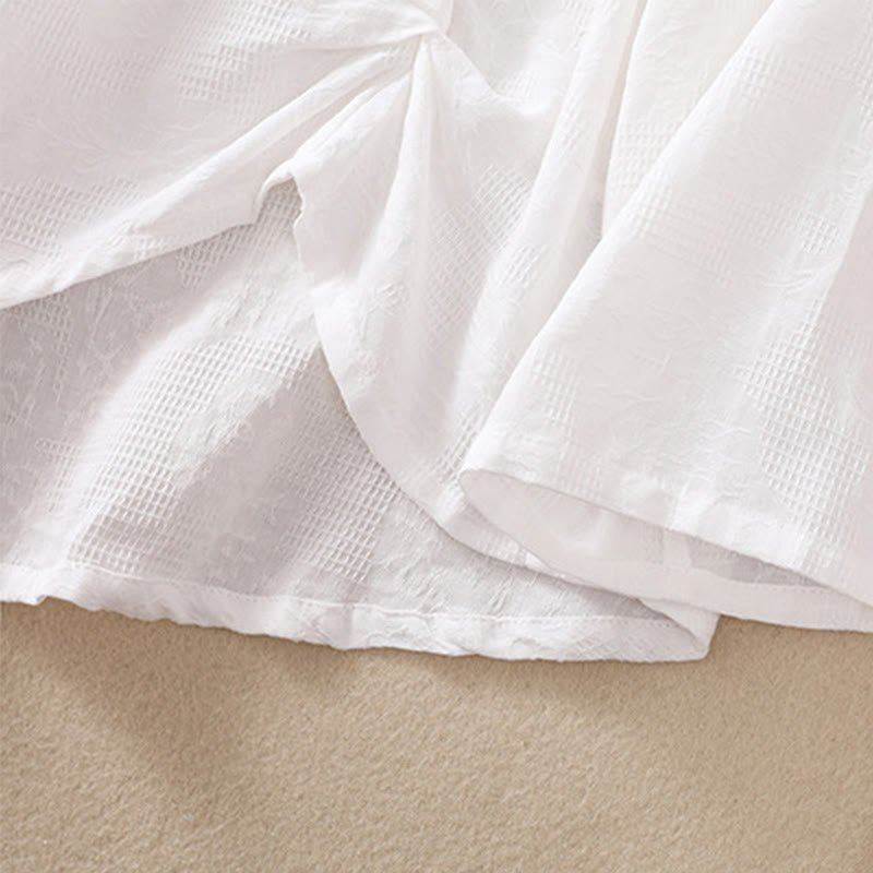 Koszula damska z długim rękawem z bawełny z nadrukiem "Buddha Stones" w nieregularnym dole i plisami - image 14