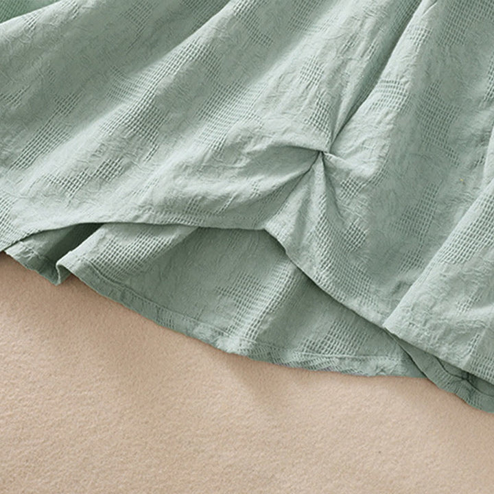 Koszula damska z długim rękawem z bawełny z nadrukiem "Buddha Stones" w nieregularnym dole i plisami - image 37