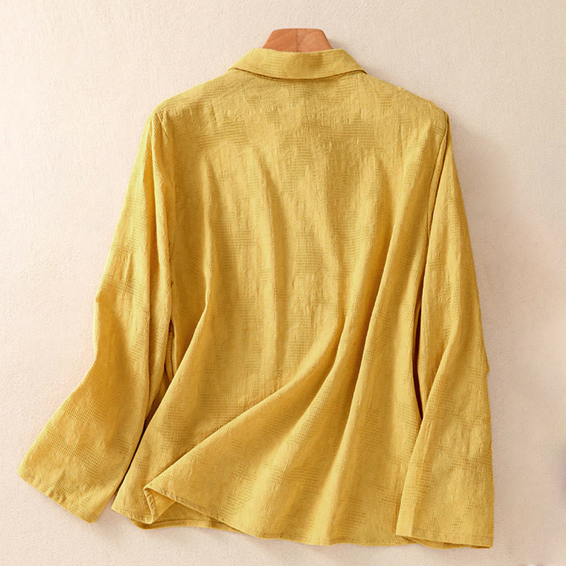 Koszula damska z długim rękawem z bawełny z haftem "Jesienne Buddha Stones" w asymetrycznym wzorze i żabą zapinaną na guziki - image 25