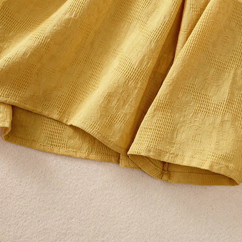 Koszula damska z długim rękawem z bawełny z haftem "Jesienne Buddha Stones" w asymetrycznym wzorze i żabą zapinaną na guziki - image 30