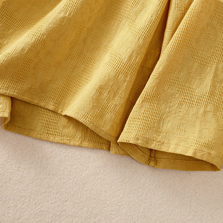 Koszula damska z długim rękawem z bawełny z haftem "Jesienne Buddha Stones" w asymetrycznym wzorze i żabą zapinaną na guziki - image 30