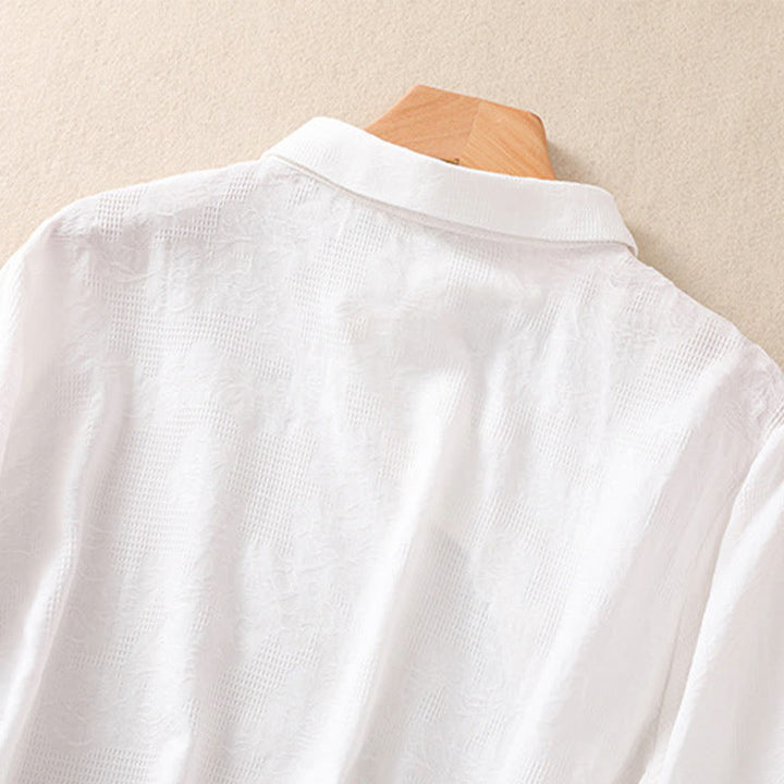 Koszula damska z długim rękawem z bawełny z haftem "Jesienne Buddha Stones" w asymetrycznym wzorze i żabą zapinaną na guziki - image 10