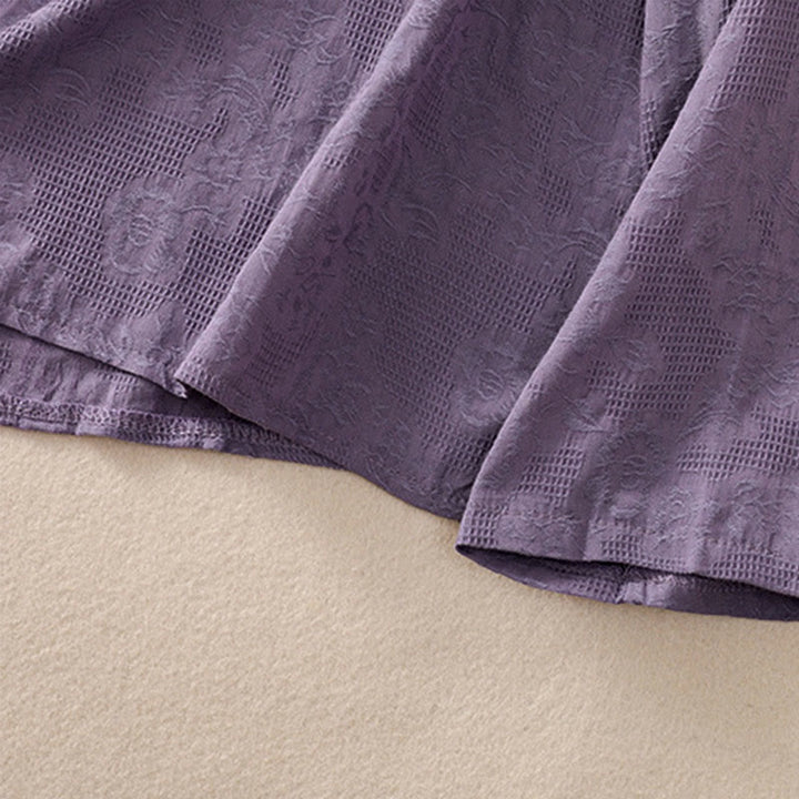 Koszula damska z długim rękawem z bawełny z haftem "Jesienne Buddha Stones" w asymetrycznym wzorze i żabą zapinaną na guziki - image 37