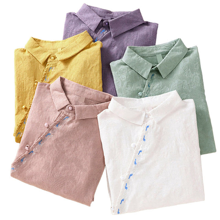 Koszula damska z długim rękawem z bawełny z haftem "Jesienne Buddha Stones" w asymetrycznym wzorze i żabą zapinaną na guziki - image 40