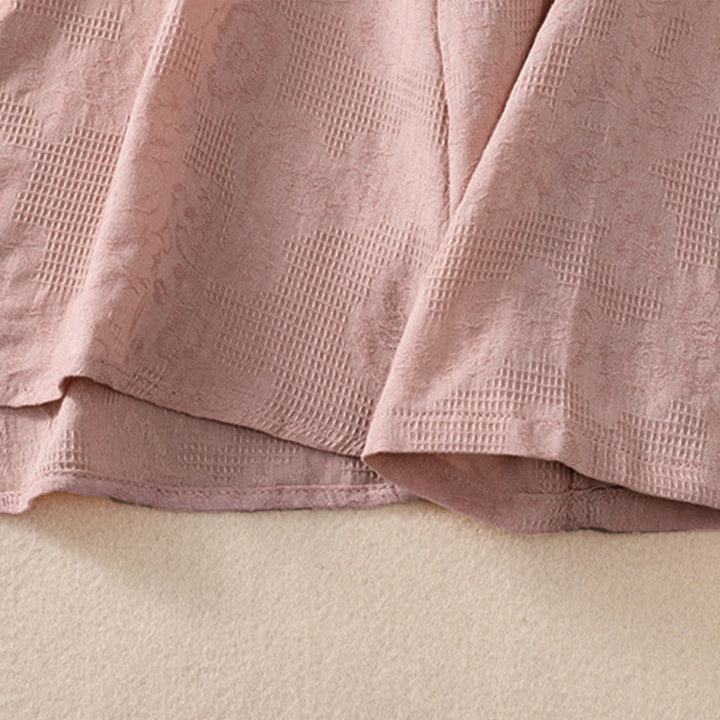 Koszula damska z długim rękawem z bawełny z haftem "Jesienne Buddha Stones" w asymetrycznym wzorze i żabą zapinaną na guziki - image 22