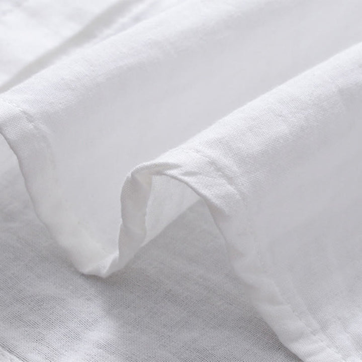 Koszula damska z długim rękawem z bawełny z haftem w geometryczne paski z motywem kamieni Buddha Stones w kolorze białym i kwiatowym - image 8