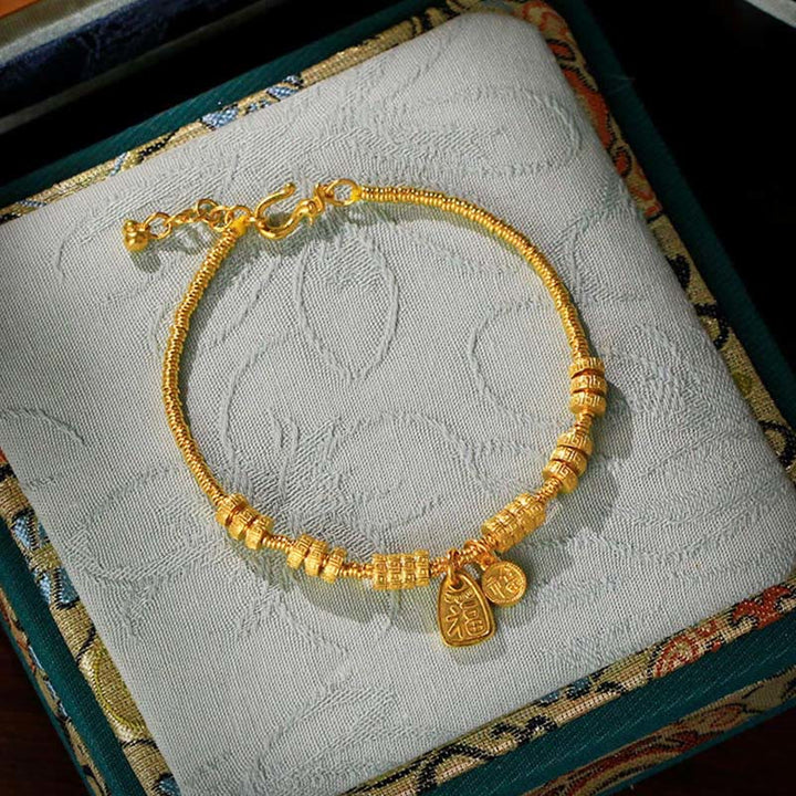 Bransoletka z Buddha Stones, 24-karatowym złotem, mosiądzem, z symbolem Fu i talizmanem szczęścia - image 0