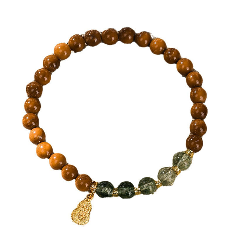 Bransoletka odstraszająca złe duchy z zielonymi fantomowymi Buddha Stones z nasionami Kuki - image 3