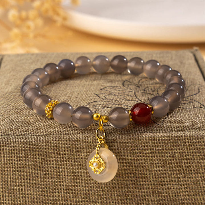 Bransoletka z Buddha Stones, szarego agatu i czerwonego agatu z chalcedonem - Agat szary (obwód nadgarstka: 15-16 cm) - image 0